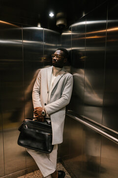 African American male in elevator