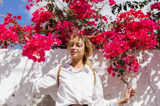 Girl among flowers