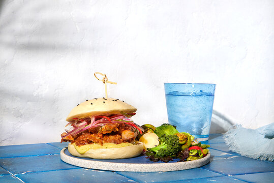 Peruvian Sandwich on a Bao Bun with papas fritas