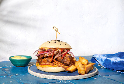 Peruvian Sandwich on a Bao Bun with papas fritas