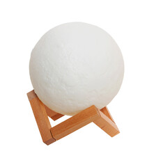 moon lamp on a wooden stand, on a white background in isolation