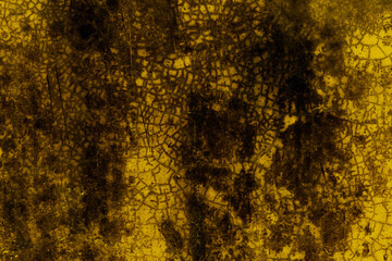 Cracked old concrete floor with yellow overlay for texture background