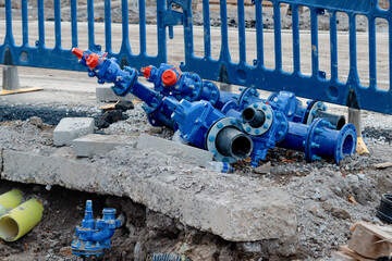Ductile iron pipes fittings and valves delivered on construction site during the installation of...