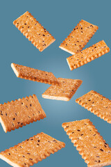 sweet cookie flies on a blue background, selective focus