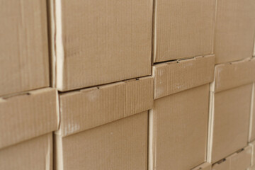 Set of cardboard brown boxes in storehouse. Background of carton boxes in wsrehouse