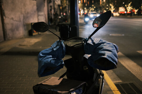 Scooter With Handlebar Muffs In Shanghai, China.
