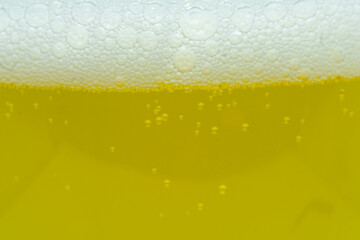 Beer with foam full screen