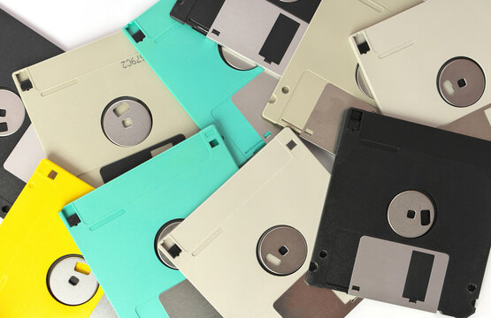 Full Frame Close up of 3.5 Inch Floppy disks for background. Retro digital storage technology.