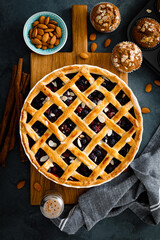 Almond and berry pie with lattice pastry, flat lay, top view