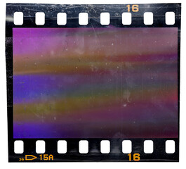 macro photo of empty and blank 35mm filmstrip on white background with sticker on border edges and strange scanning light interferences, cool photo placeholder, transparent cellotape on film.