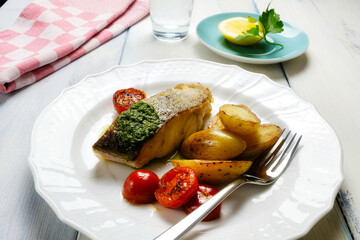 Cod fillet with potatoes and salsa verde