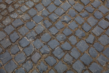 Closeup of cobblestone pavement background