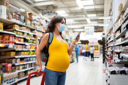 Pregnant Woman In The Supermarket