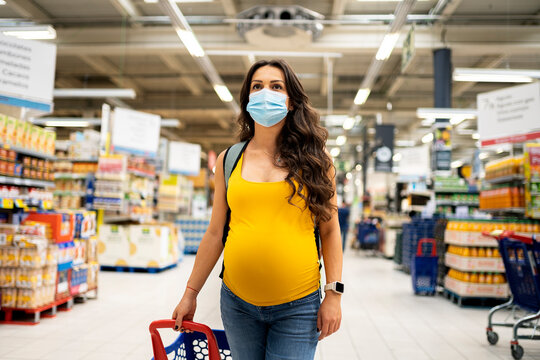 Pregnant Woman In The Supermarket