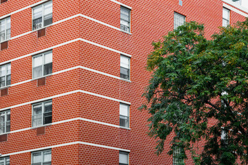 the corner of a red brick building 