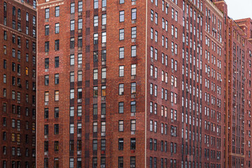 window patterns of a red brick building