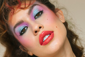 Portrait of a woman posing with an eighties look