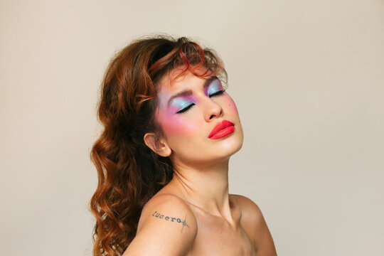 Retro woman with eyes closed with eighties look
