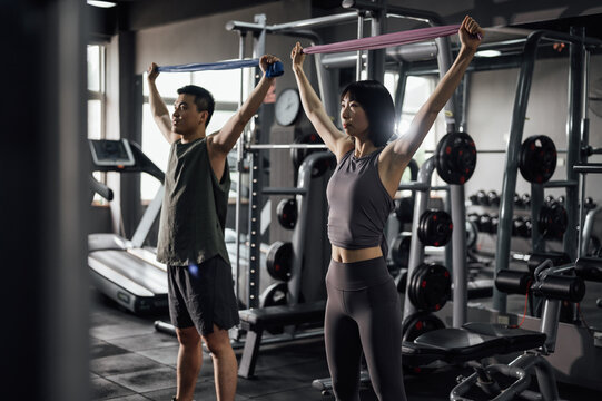 Young Asian couple  exercising 