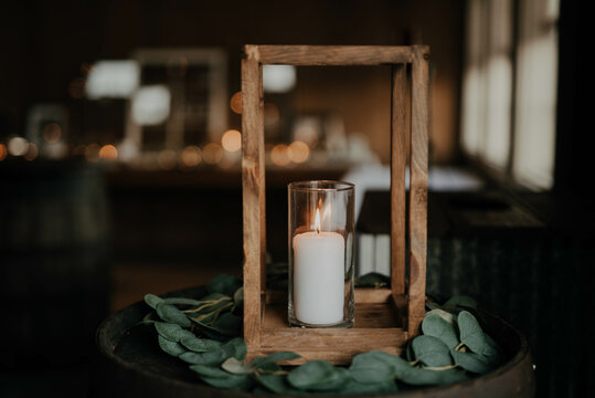 A candle lit at a wedding
