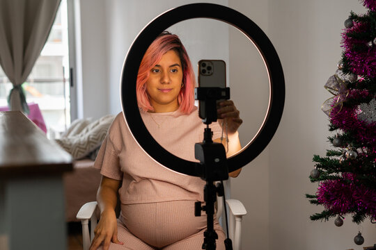 Pregnant young woman in a Livestream
