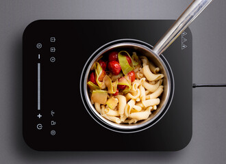 The process of cooking food in a pan top view. Various Ingredients.