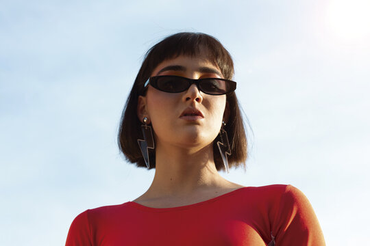 Portrait of a young woman with black sunglasses