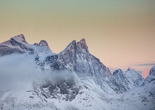 snow covered fjord peaks