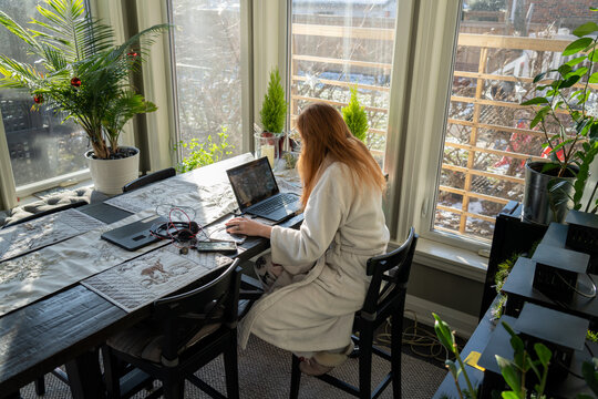 Woman Working from Home at Table