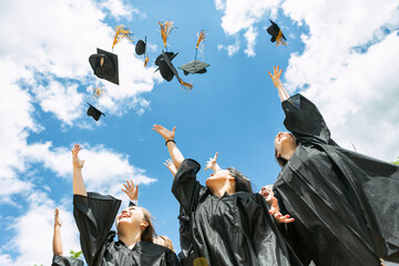 Grad: Recent Graduates Toss Their Caps In The Air