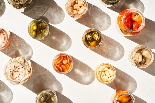 Glass jars with assorted pickled products