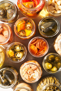 Set of assorted pickles in jars