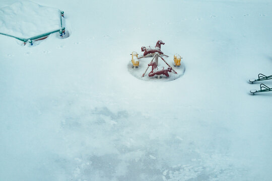 A carousel on the playground.
