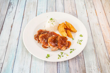 Pork tenderloin with soy sauce. Dressing, seasoning, accompaniment..., essential in oriental cuisine, achieved after fermentation