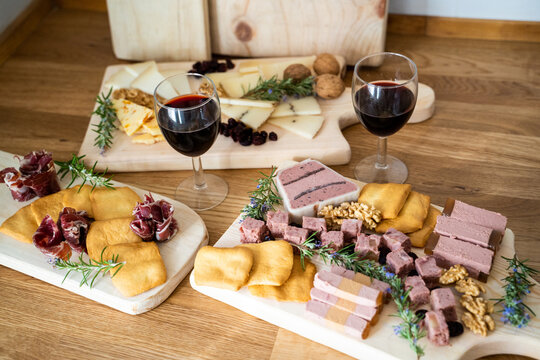 Delicatessen board with cured ham, cheese and pate