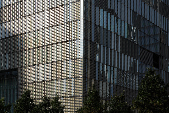 a corner building illuminated by the sunlight