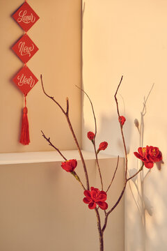 Lucky Knot Hanging On Flower For Lunar New Year Greeting, Vietnamese Character Means Happy New Year