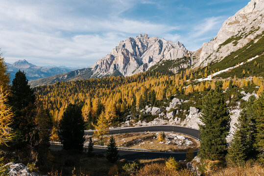 View of the serpentine in the Dolomite Alps. Mountain view from Passo di Valparola in autumn near Cortina d'Ampezzo, Belluno in Italy