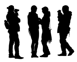 Photograph and photo camera on street. Isolated silhouettes of people on white background