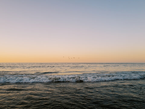 Ocean waves at sunset