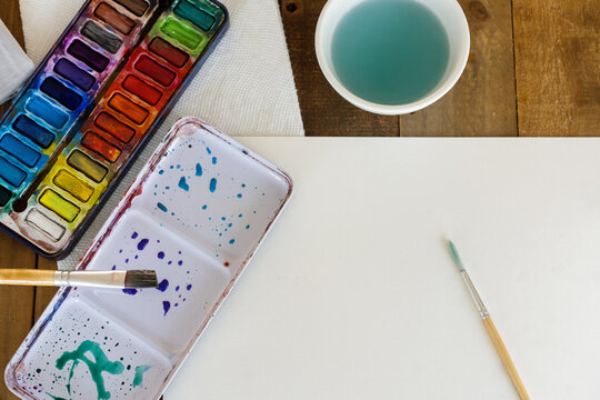 Watercolors and paper