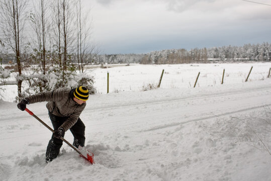 Man shovelling fresh snow