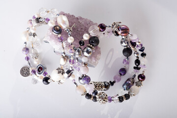 jewelry bracelets with semiprecious and crystal at white background. hobby concept
