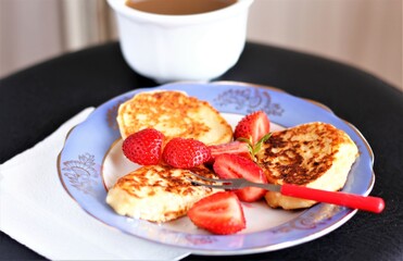 closeup breakfast with coffee pancakes and strawberry food dessert tasty sweet pastry bakery cake red berry yummy morning caffeine espresso latte cappuccino meal plate fork