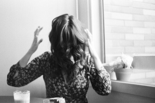 Funny woman shaking her hair