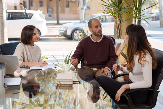 Couple in crisis talking during session with sexologist