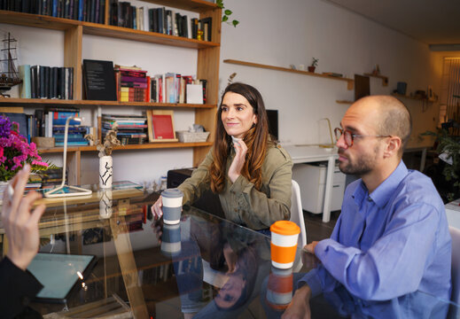 Couple talking to sexologist during session