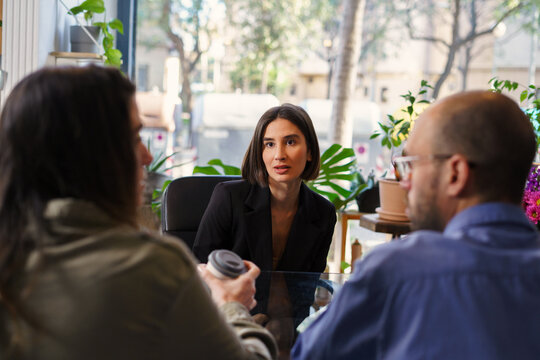 Sexologist consulting couple during therapy session