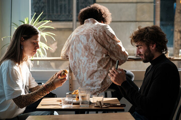 Couple enjoy lunch at restaurant