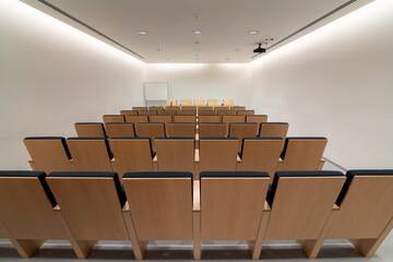 Rows of seats in spacious meeting room